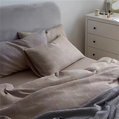 Wafelstof voor beddengoed